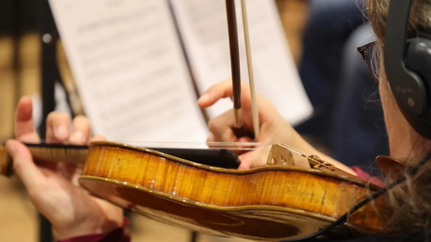 Close-up of a violin and bow during a string recording